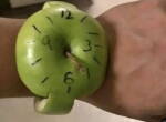 Pomme verte en forme de montre