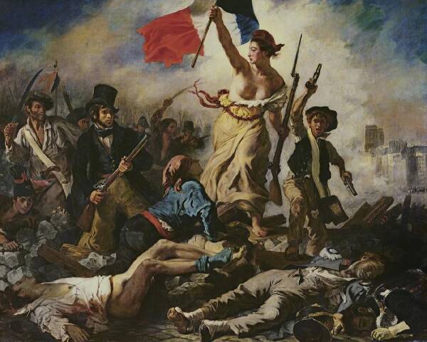 Femme au drapeau sur une barricade